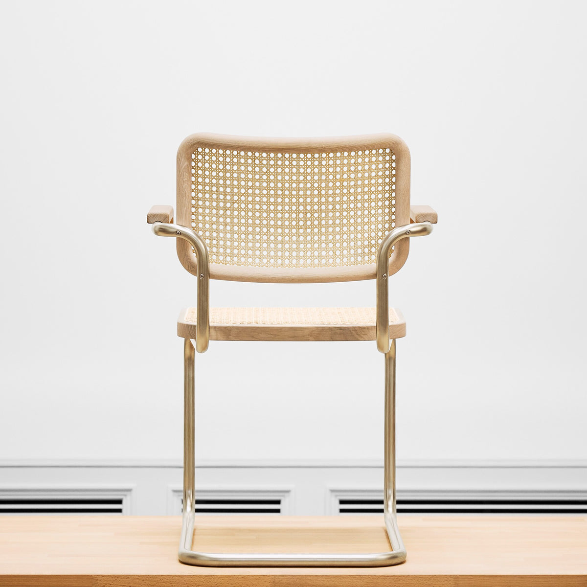 Thonet JS. THONET a personal Interpretation by Jil Sander S 64 V Nordic Freischwinger Armlehnstuhl mit Rohrgeflecht