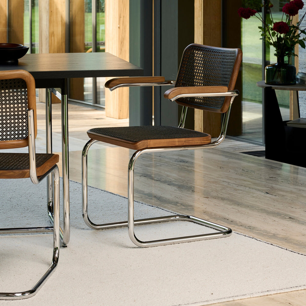 Thonet S 64 V Freischwinger Armlehnstuhl mit Rohrgeflecht Dark Melange Gestell verchromt